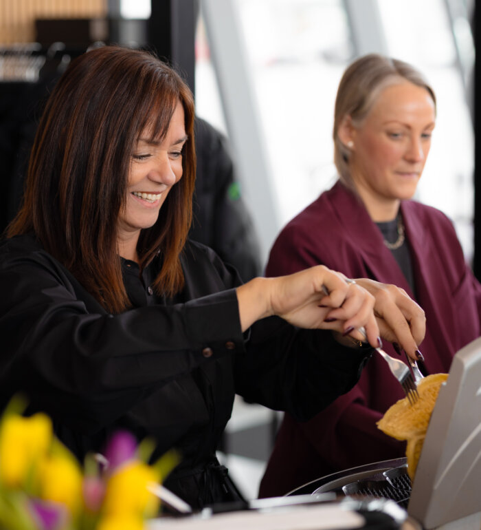 Anneth behind the truck 