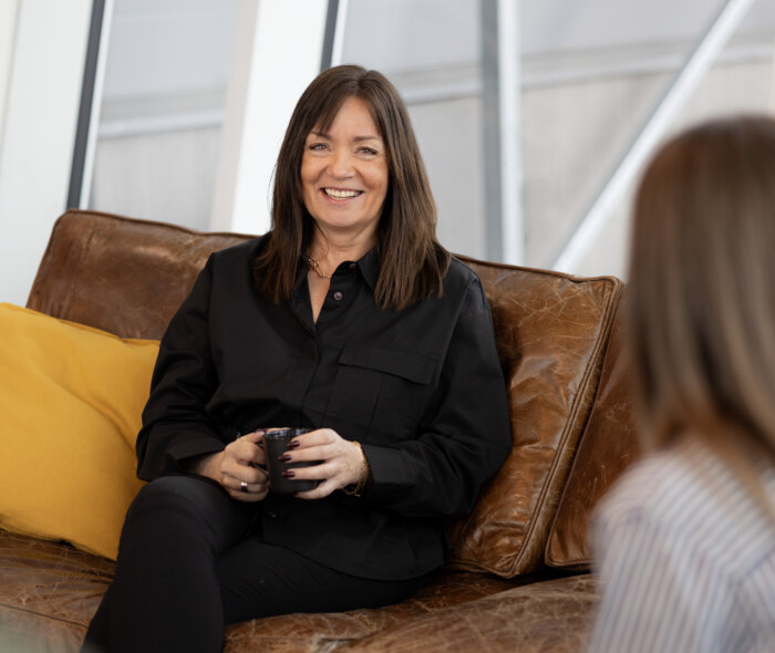 Anneth behind the truck 